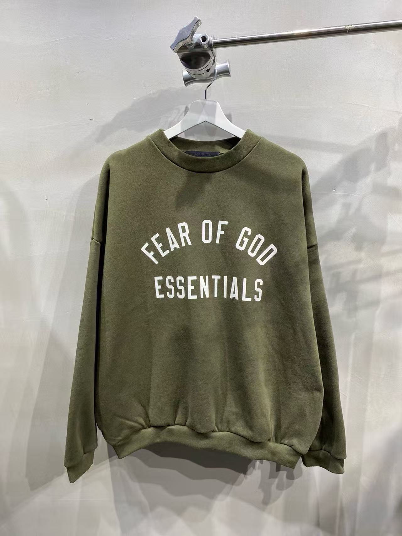 Essentials Hoodie — fcfaaa5c angle 1
